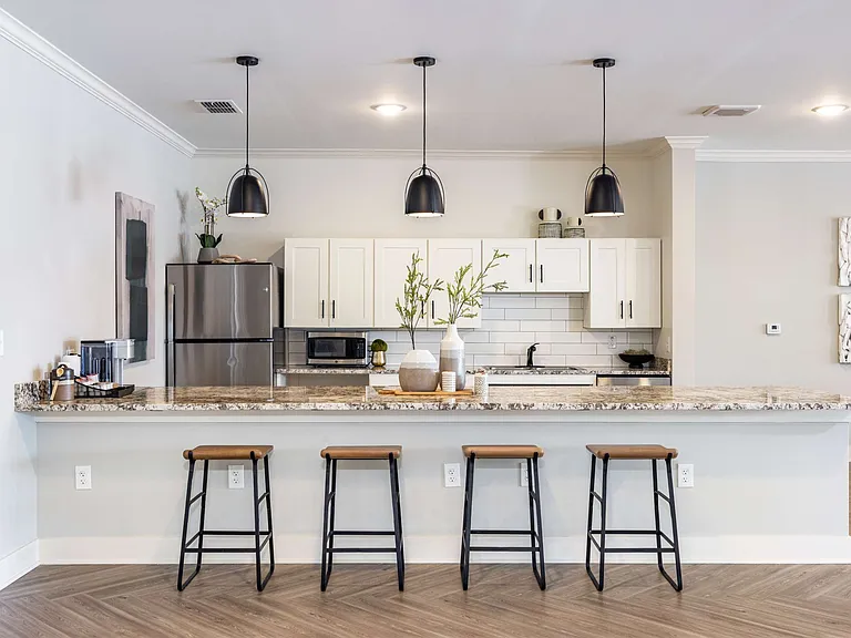 Community clubhouse kitchen with coffee bar at The Groves at Lake Juliana