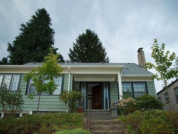 The house last summer, before the new windows were added.