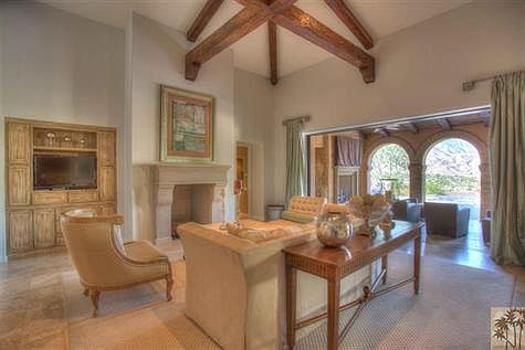Living room with pocket sliding doors which opens up to covered outside loggia.