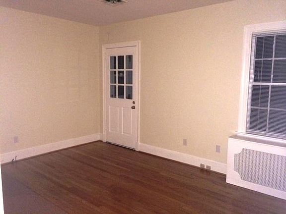 office or playroom that leads to back deck