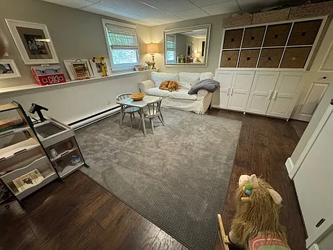 half finished basement reverse w/ built in storage shelves