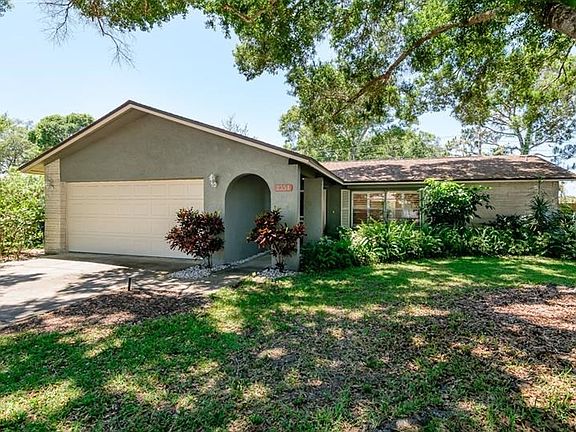 Extended Arched Entryway + a Spacious Driveway & 2 Car Garage!