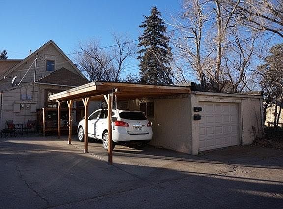 Alley access with Garage and Carport