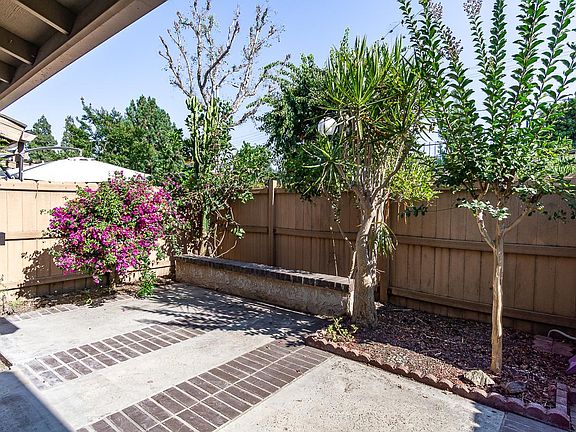 Private gated courtyard entry.