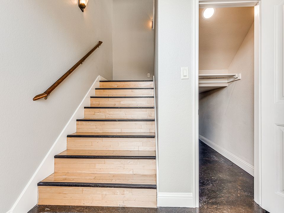 2700 Merida, Fort Worth, TX. Foyer and steps up to unit. Under-stair storage.