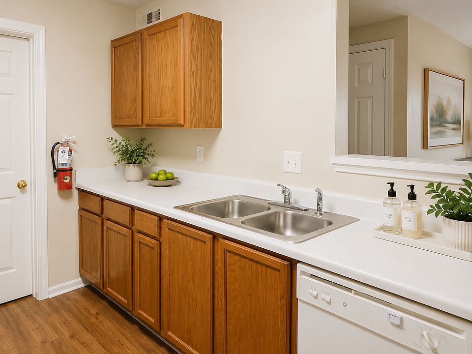 Functional kitchen with generous cabinet space, full-size appliances, and plenty of countertop for everyday cooking.