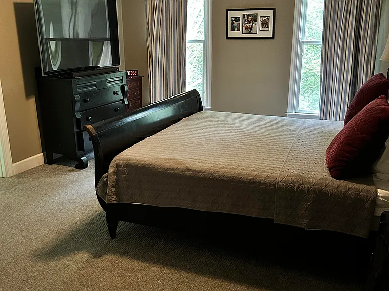 Master bedroom; king size bed, 65 in 4k TV, Whisper quiet remote control Hunter ceiling fan.