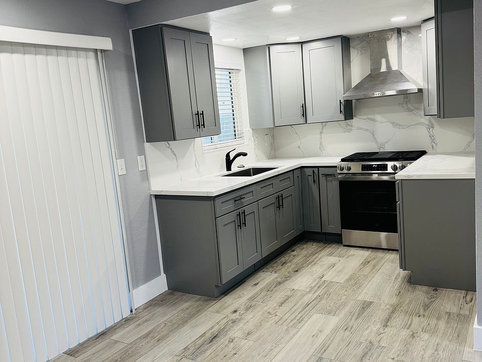 Kitchen area with sliding door for patio area