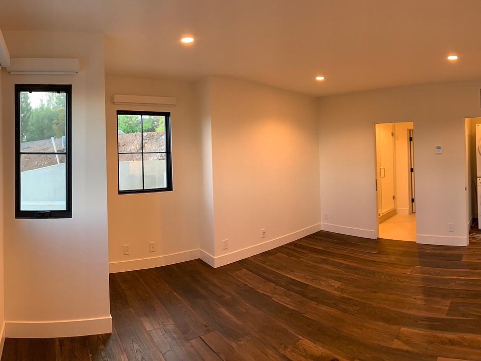 The ADU has a large bedroom and in-unit laundry.