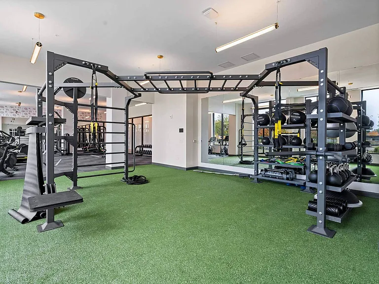 Train with your bodyweight, kettlebells, and beyond in the 24/7 fitness center at The Hallon Luxury Apartments in Hopkins MN | apartments near St Louis Park MN