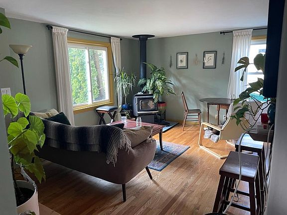 Living room from hallway. Plants and other personal affects will be removed to make space for renter.