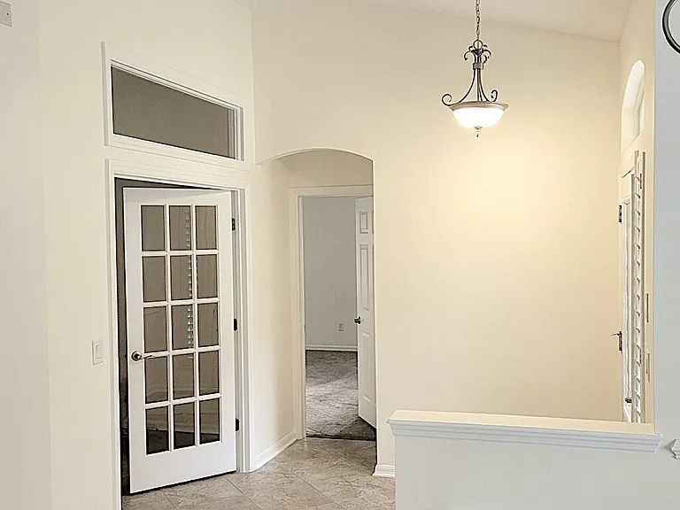 Home office entrance, picture far left of primary suite entrance