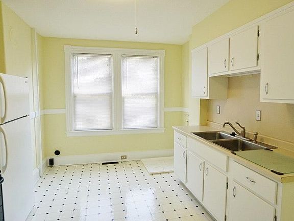Kitchen with washer, dryer hookup.