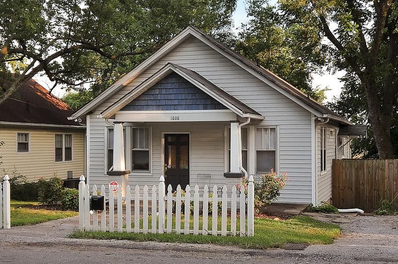 house front with driveway for parking