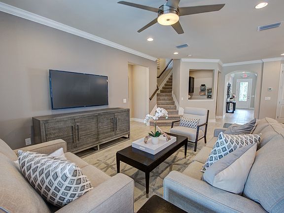 Model Representation Spacious gathering room with tile floors