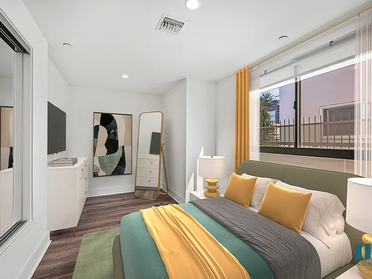 Bedroom with Large-Sized Windows and Mirrored Closet - Two-Bedroom Two-Bathroom - Unit 108