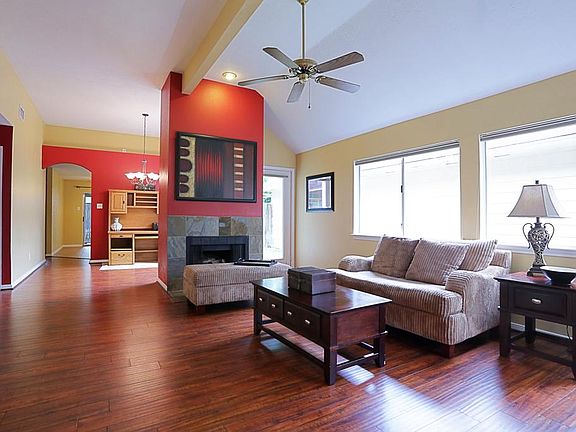 Open floor plan with plenty of sunlight.
