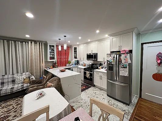 2nd image of 19-56 79th St #1