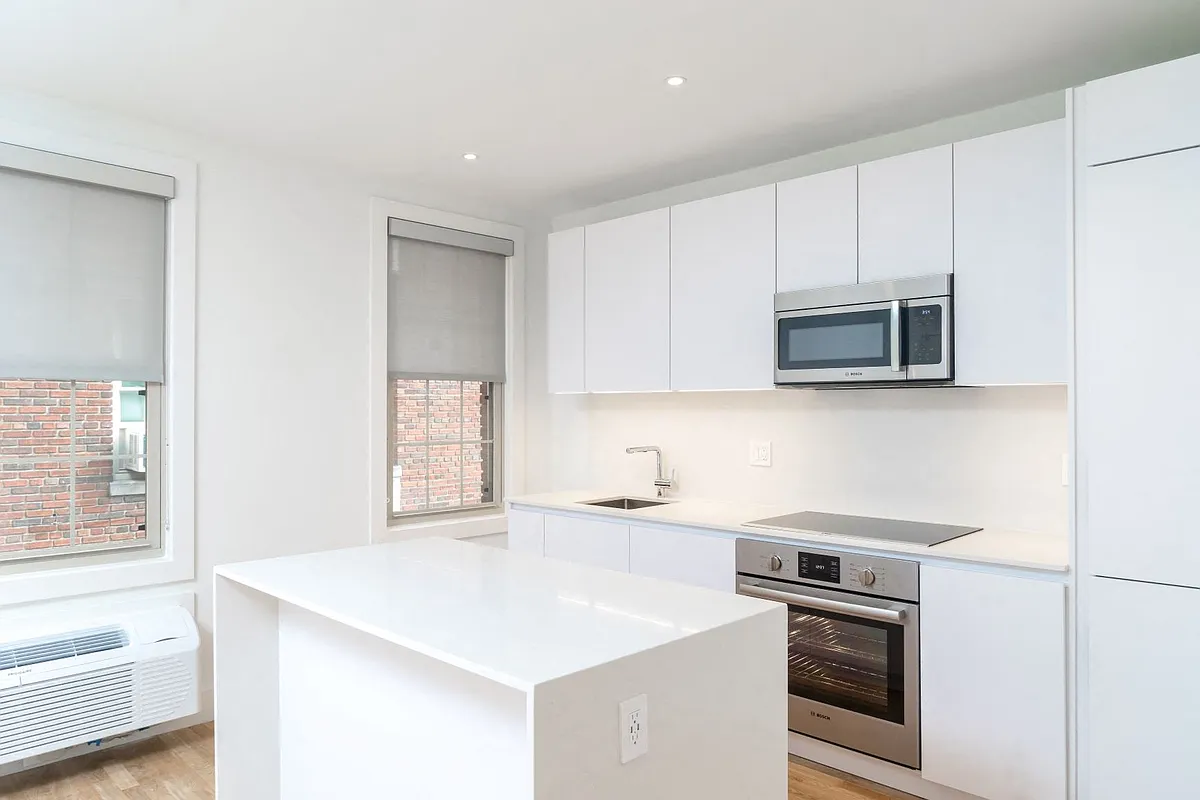Updated kitchen with stainless steel appliances and granite countertops - 501 12th Street