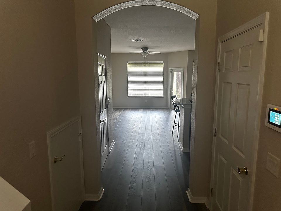 Entry way Hallway. Garage door is on the left hidden storage closet on the left.