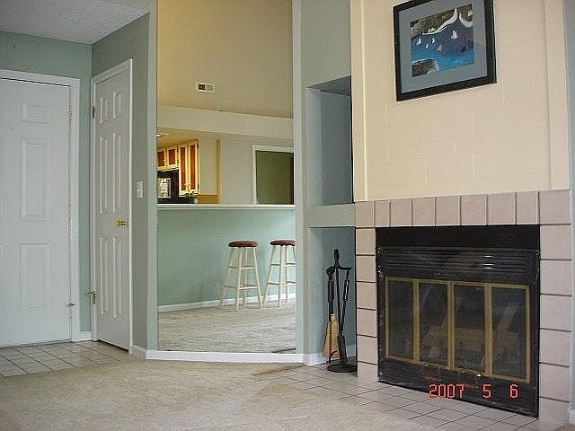 front door and walk-in closet. Fireplace (decorative)