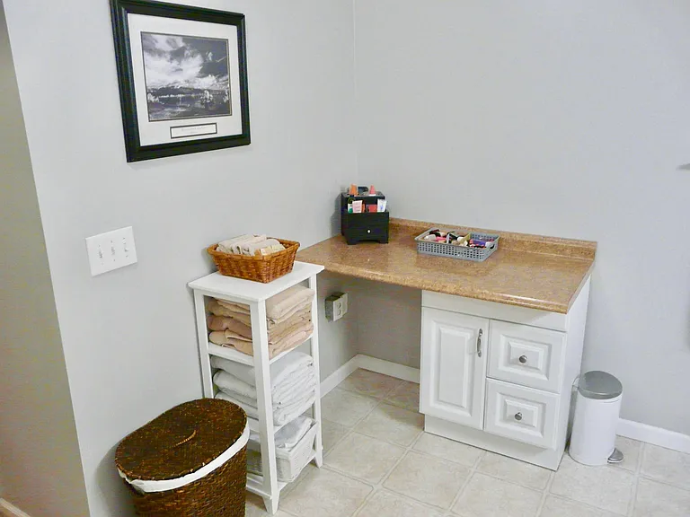Separate little station in Master Bath for make-up, etc