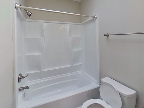 Full bathroom with tub