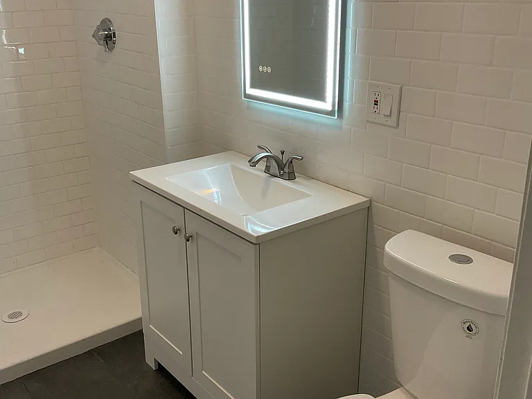 brand new tiled modern bathroom! 2 full bathrooms in the apartment!