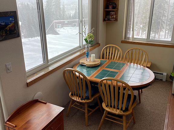 Dining room with expandable table- seating for up to six people.