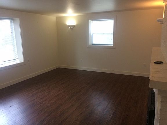 Living Room with Windows Facing North and West