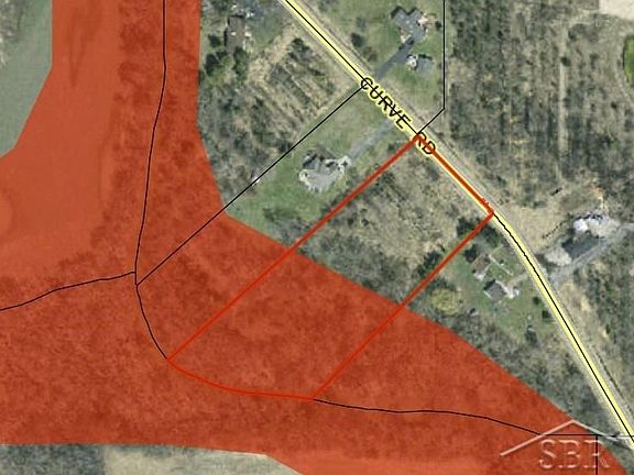 Red highlighted area shows the flood plain.  Plenty of room to build a home not in flood plain, so you can avoid flood insurance.