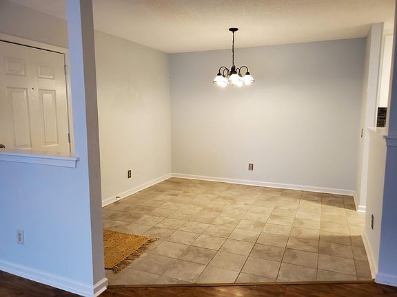 Dining area to the left of front door.