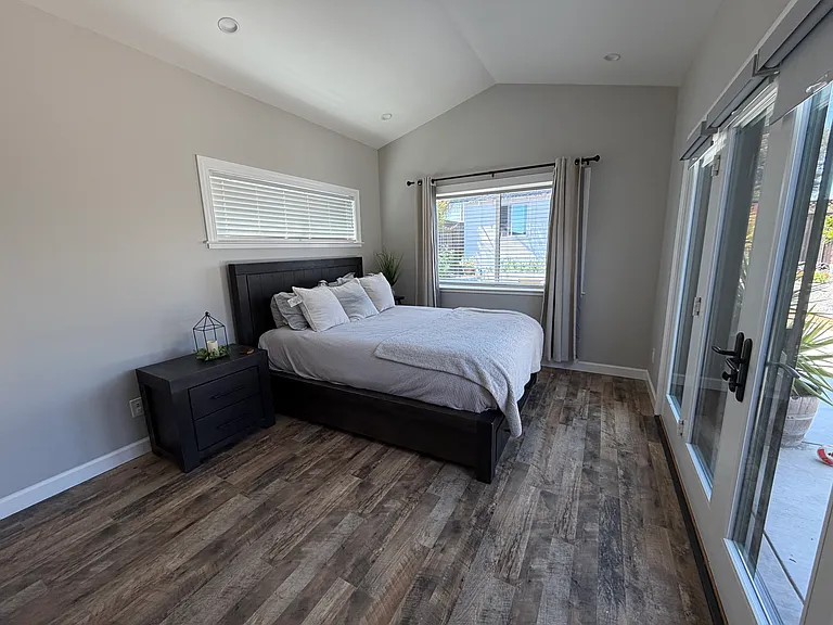 5th bedroom located at the south side of the house, with access to the backyard