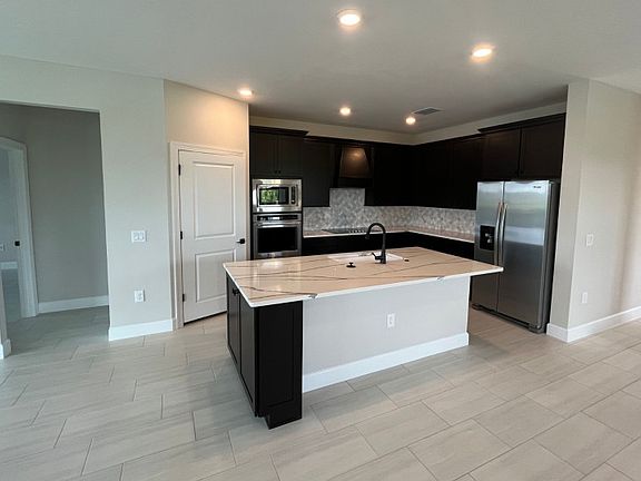 Thoughtfully designed kitchen with stainless steel appliances