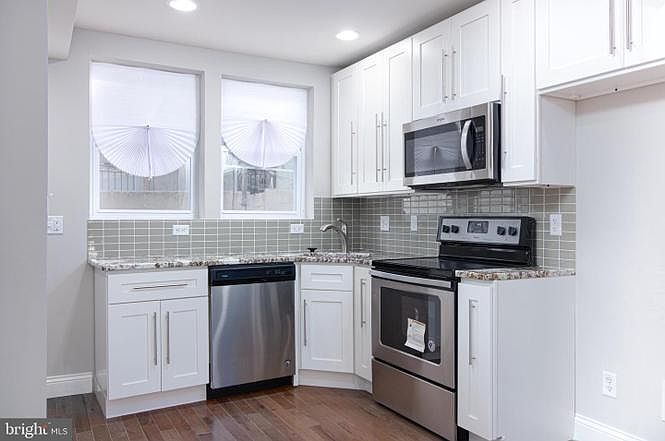 Newly Renovated Kitchen -Granite Countertops -Dishwasher -Above the Range Microwave -Stove -Oversized Cabinet Pulls