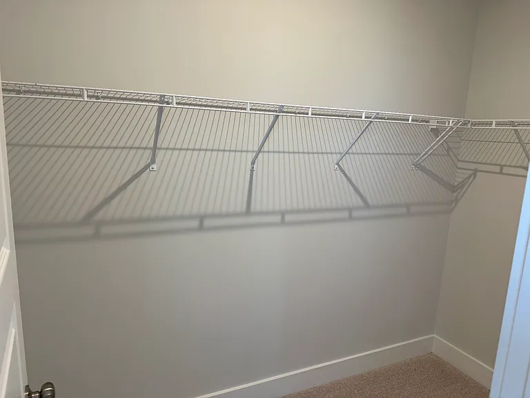 Primary Bedroom Walk-In Closet
