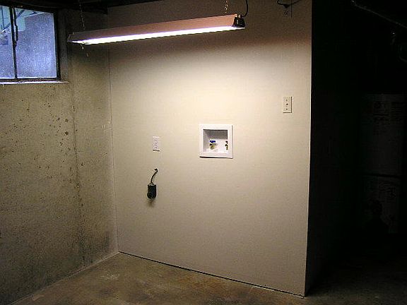 Laundry area in basement
