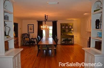 Dining/Hearth Room
						:
						Extensive mouldings, trim and built-ins