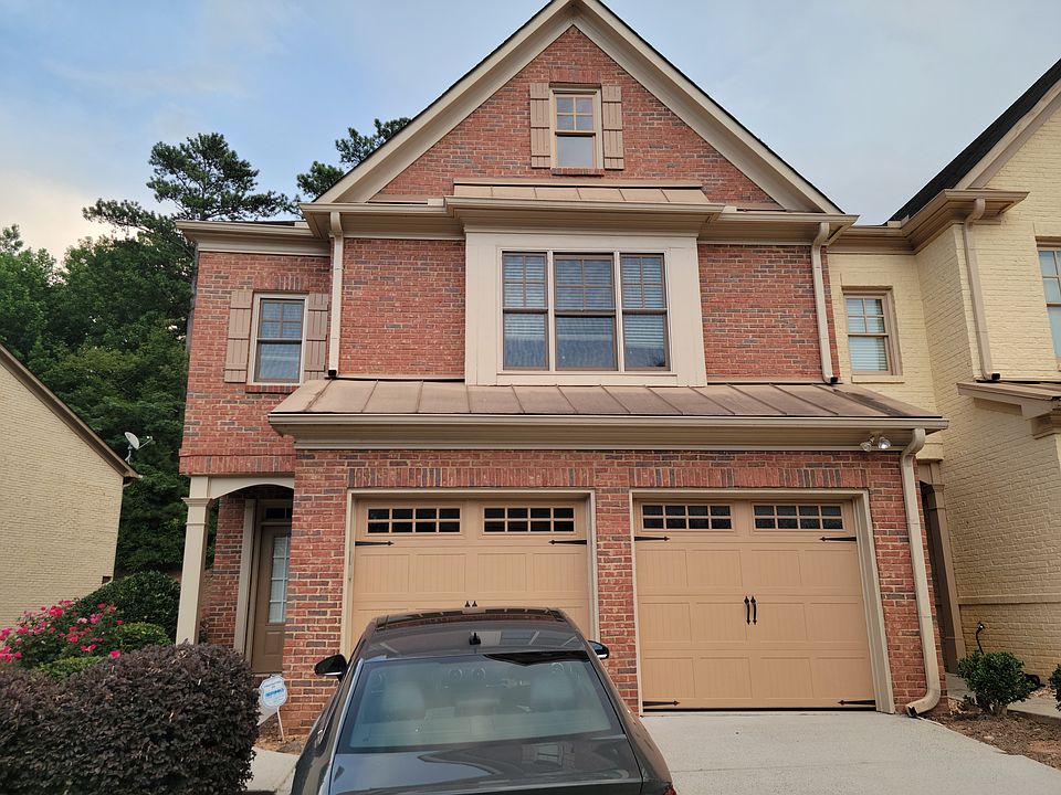 Front of Townhome, Brick, End Unit, Two Car Garage