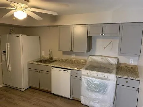 New kitchen with lots of storage and new life proof plank flooring thruout the house.
