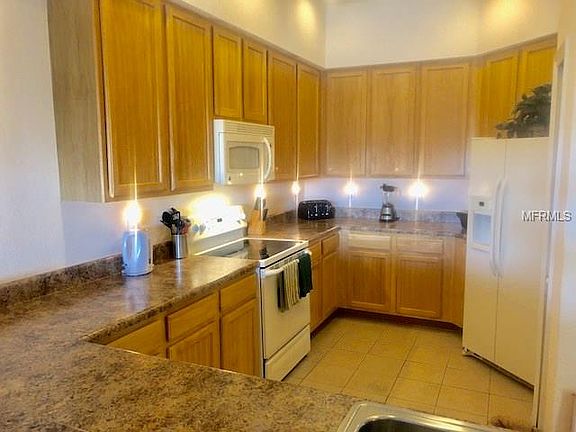 4th image of 9055 Treasure Trove Ln Unit 401