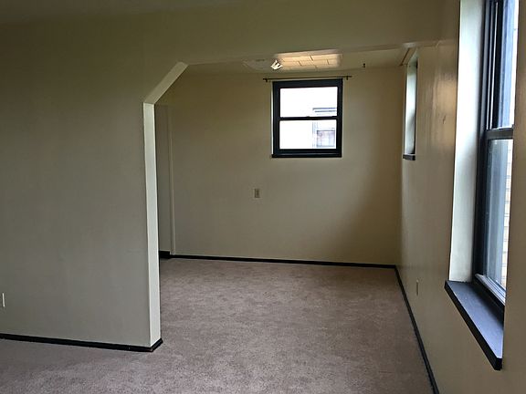 Living room into the kitchen/dining area
