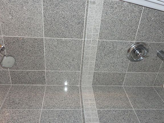 Full bath with stand up shower and whirlpool tub