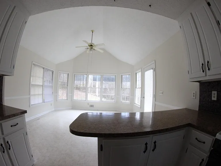 breakfast bar leading to huge dining area