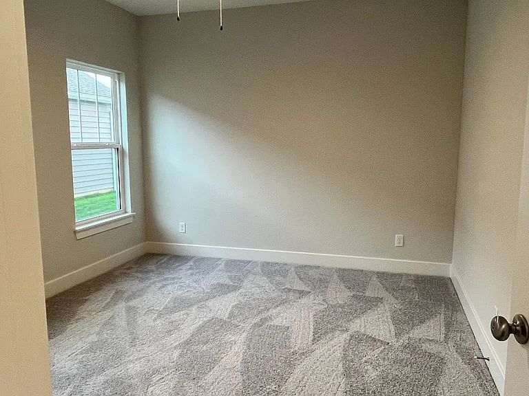 Primary bedroom with walk in closet.