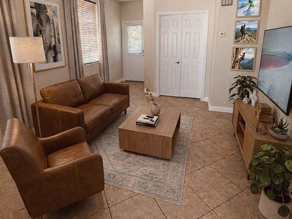Living Room (Staged) with French Doors opening to Dedicated Office Space