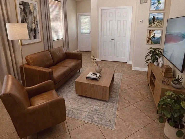 Living Room (Staged) with French Doors opening to Dedicated Office Space