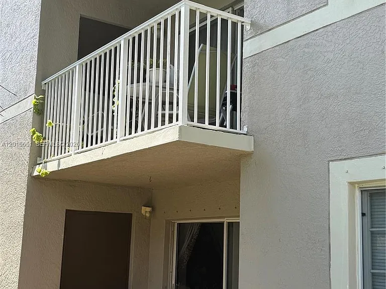 5045 Wiles Rd #201 — Photo 14