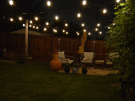 lit backyard at night