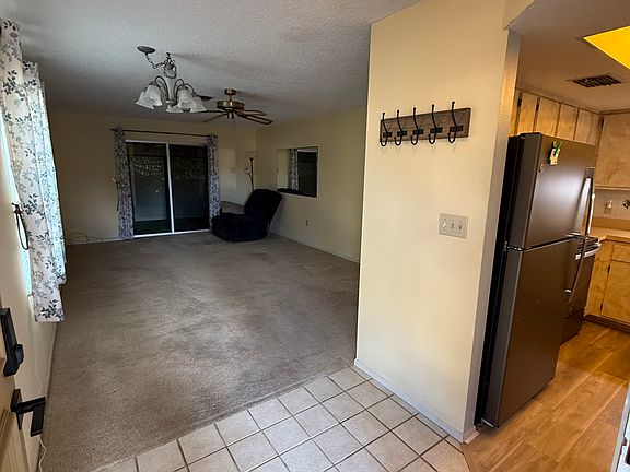 Entryway, dining and living room combo